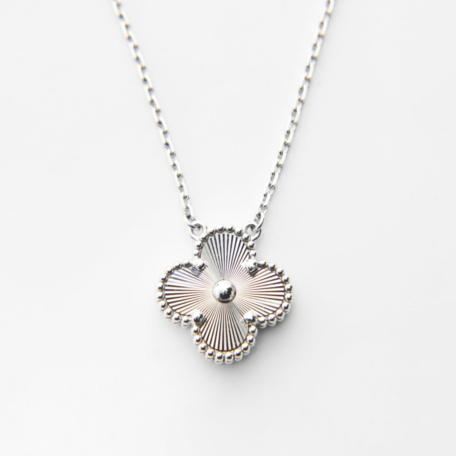 Van Cleef & Arpels Au750 Alhambra Guilloche White Gold Necklace Silver: Van Cleef & Arpels Au750 Alhambra Guilloche White Gold Necklace Silver Van Cleef & Arpels Au750 Alhambra Guilloche White Gold Necklace Silver features a striking 15mm x 15mm white gold pendant with in