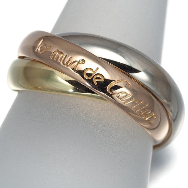 Cartier Ring Trinity 3Color Classic Eu49 18K 750 Yellow White Rose Gold: Cartier Ring Trinity 3Color Classic Eu49 18K 750 Yellow White Rose Gold Cartier's iconic Trinity ring boasts a sleek, multi-tone design featuring 18k yellow, white, and rose gold. The classic Eu49