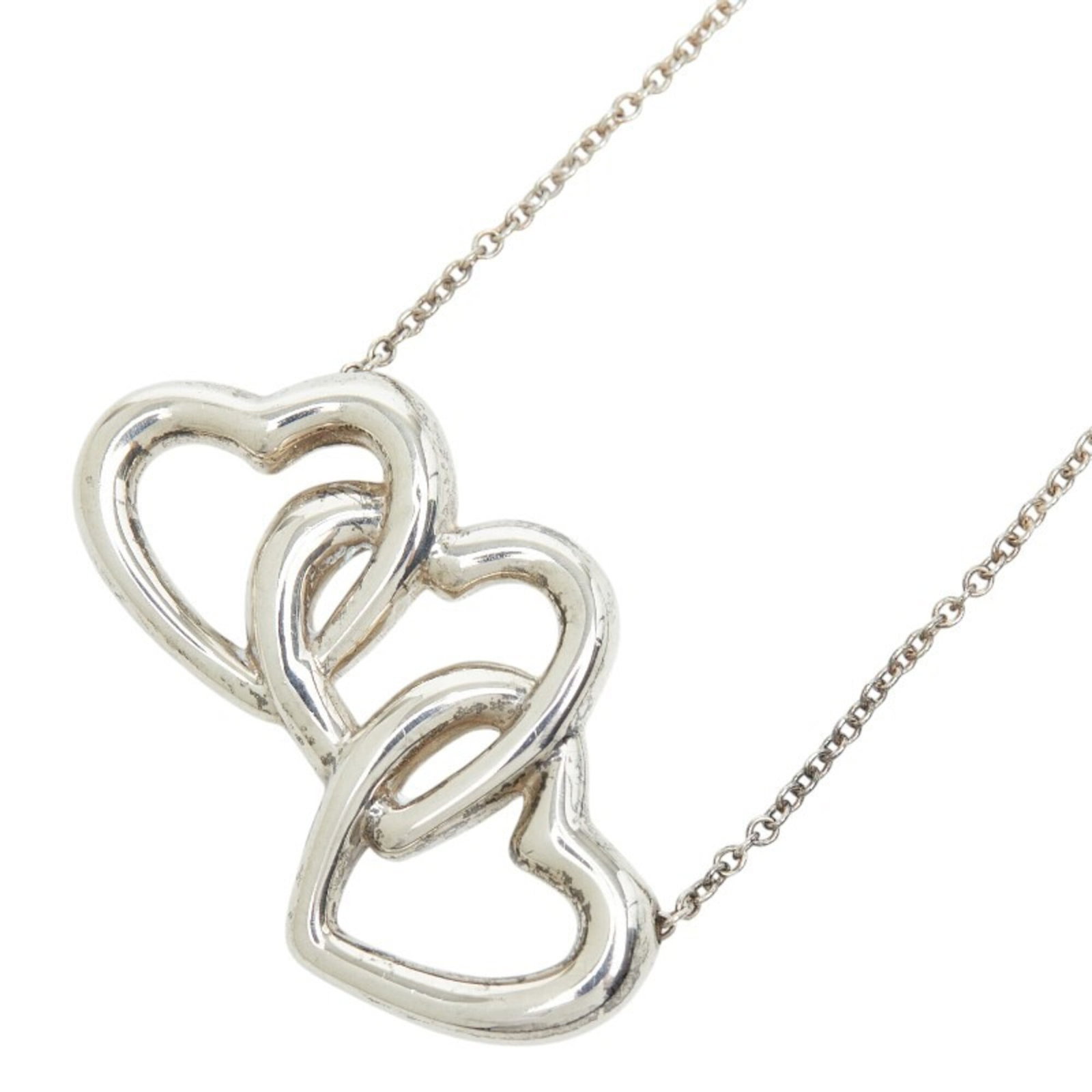 Tiffany & Co. Triple Heart Necklace Sv925 Silver Women'S.: Tiffany & Co. Triple Heart Necklace Sv925 Silver Women'S. Tiffany & Co.'s Triple Heart Necklace showcases elegant simplicity with its sterling silver 925 construction and classic design. The