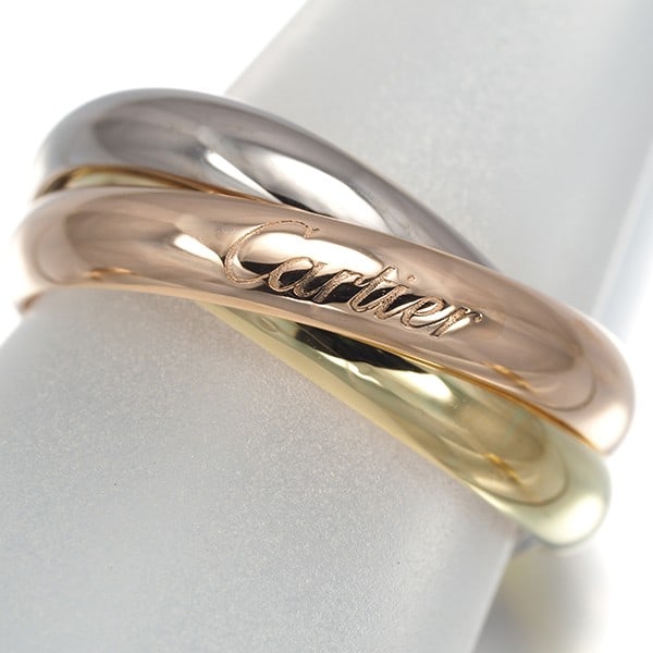 Cartier Ring Trinity 3Color Classic Eu56 18K 750 Yellow White Rose Gold: Cartier Ring Trinity 3Color Classic Eu56 18K 750 Yellow White Rose Gold Cartier's iconic Trinity ring, a masterful blend of three-tone gold, is now available. This exquisite piece features the classic