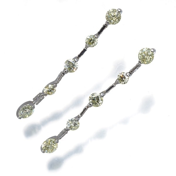 Diamond earrings 1.50ct platinum drop in yellow: Diamond earrings 1.50ct platinum drop in yellow Platinum drop earrings featuring a 1.50ct natural diamond, showcasing the beauty of yellow diamonds in a sleek design. The earrings' 900 purity platinum