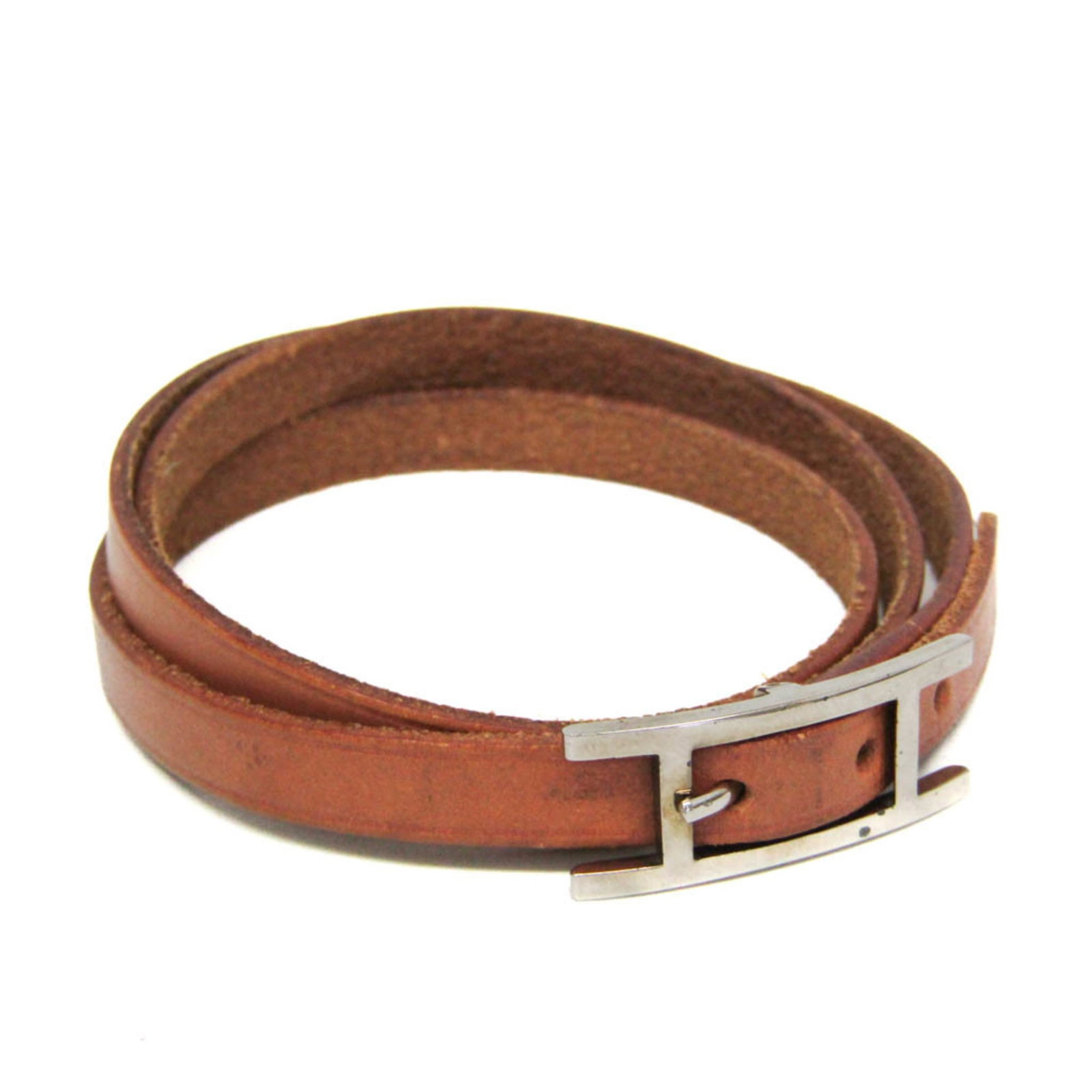 Metal Leather Bangle Hermes: Metal Leather Bangle Hermes Made from high-quality leather and metal, this Metal Leather Bangle Hermes features a classic brown and silver design. With its sleek choker style and durable construction,