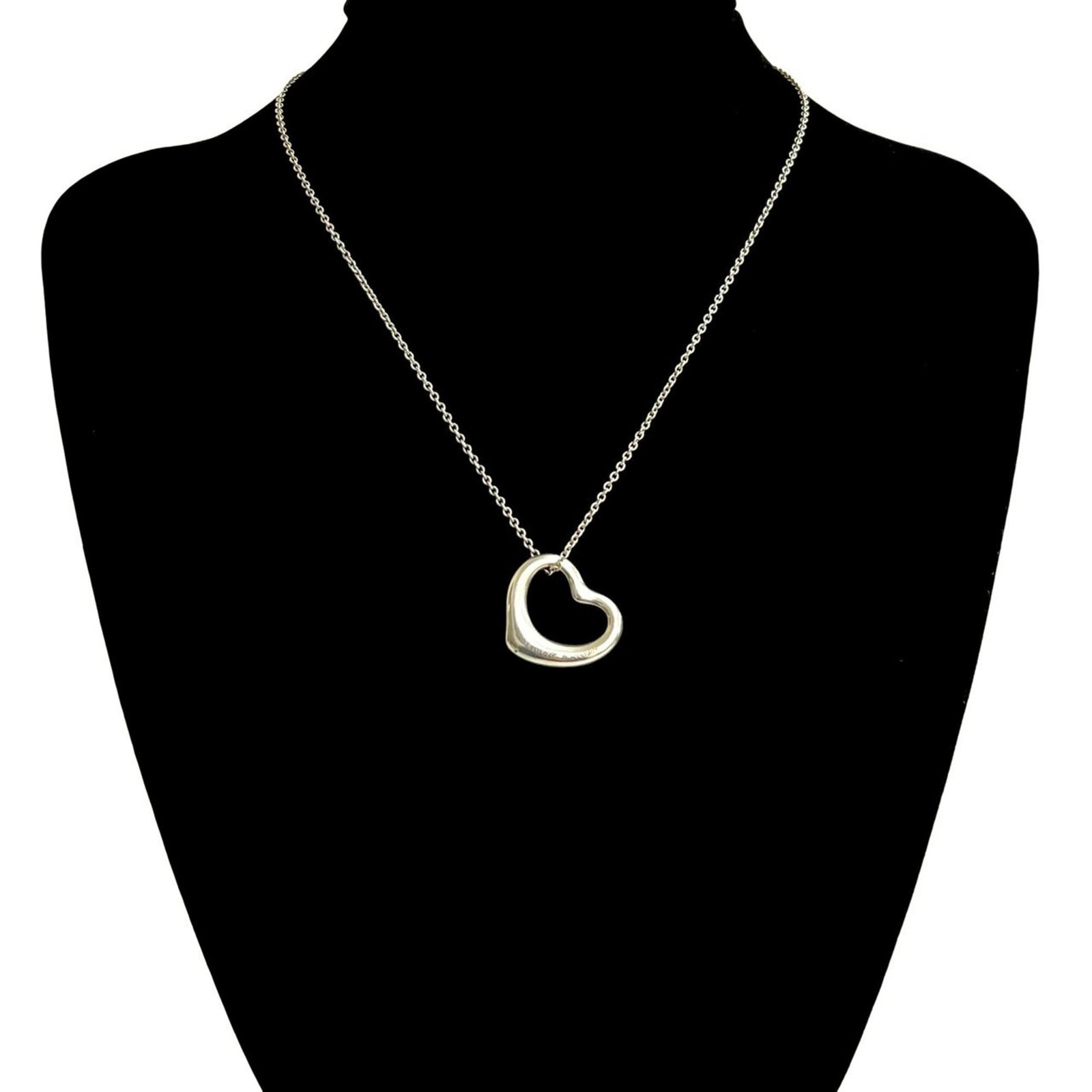 Tiffany & Co. Tiffany Open Heart Motif Sterling Silver 925 Necklace Pendant 2075B: Tiffany & Co. Tiffany Open Heart Motif Sterling Silver 925 Necklace Pendant 2075B Tiffany & Co. Tiffany Open Heart Motif Sterling Silver 925 Necklace Pendant 2075B features a beautiful sterling silver