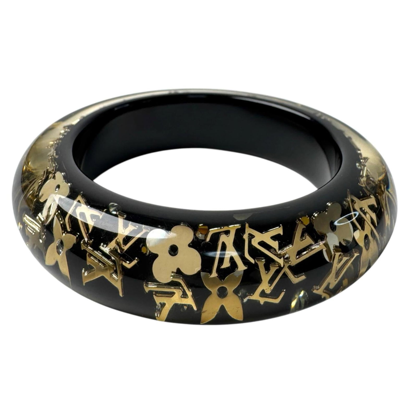 Louis Vuitton Bangle Resin: Louis Vuitton Bangle Resin The Louis Vuitton Bangle Resin boasts sleek, modern design with a striking black and gold color combination. Featuring Swarovski stones, this bangle adds a touch of luxury t