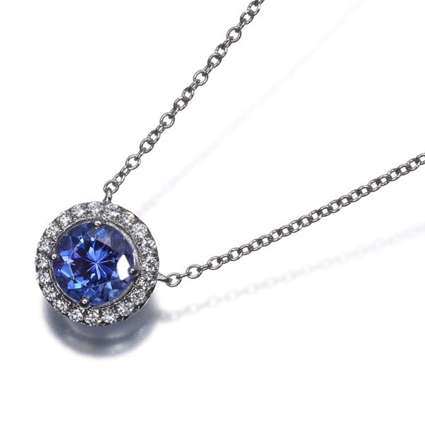 Tanzanite Diamond Necklace Platinum Tiffany&Co 950 Soleste: Tanzanite Diamond Necklace Platinum Tiffany&Co 950 Soleste Tiffany & Co.'s Platinum Soleste necklace showcases a stunning tanzanite stone, approximately 6.0mm in diameter, surrounded by diamonds. The 