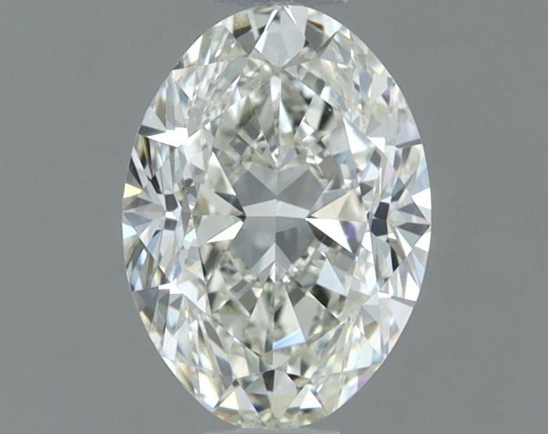 IGI Oval 0.7ct I VVS1 - Loose Natural Diamond: IGI Oval 0.7ct I VVS1 - Loose Natural Diamond 0.7ct IGI Oval Diamond with Exceptional Clarity and Polish, Measuring 6.74L X 4.87W X 3.14H in a Natural White Carat. This VVS1 clarity stone boasts EX sy