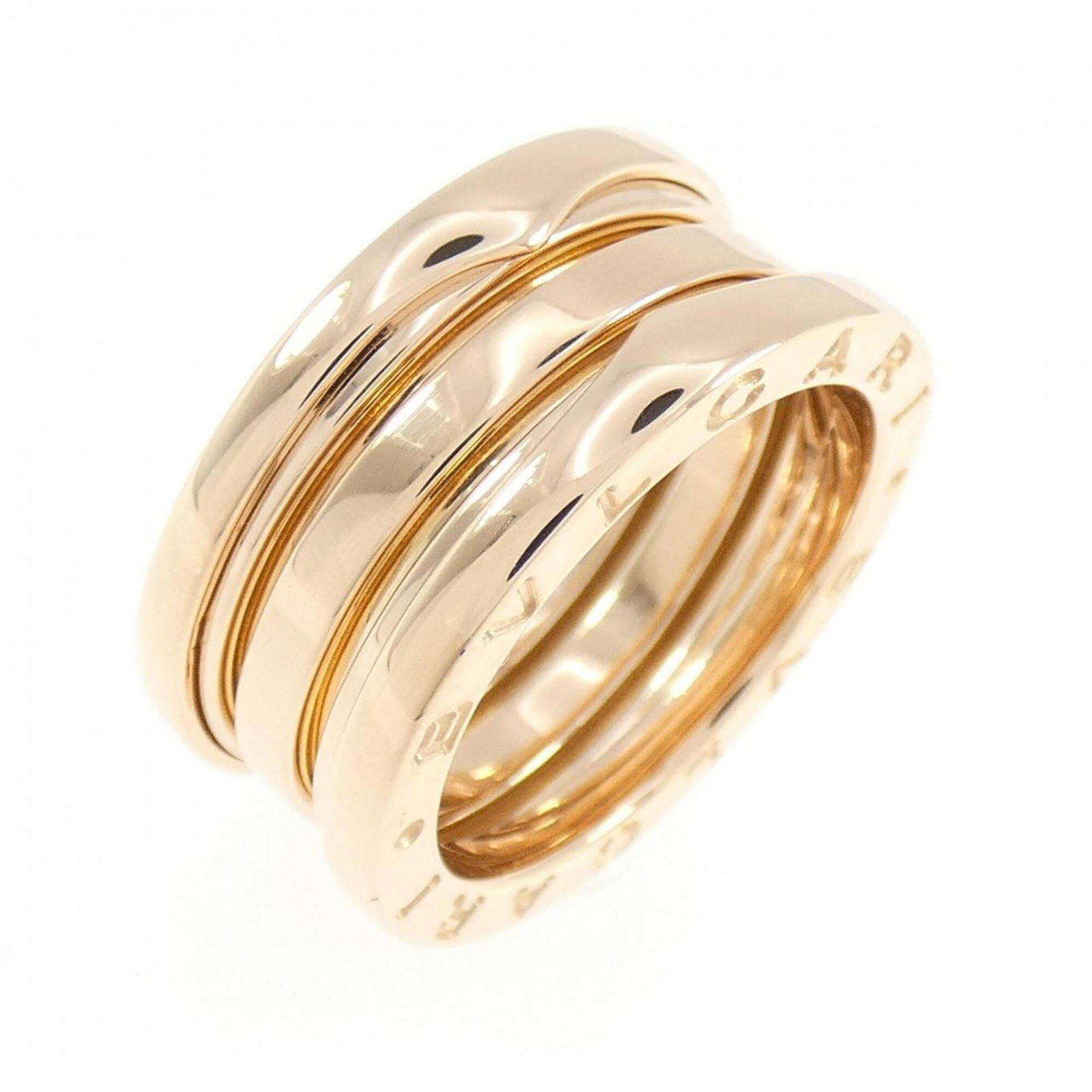 Bvlgari Band Ring Pink Gold (18K): Bvlgari Band Ring Pink Gold (18K) Pink gold (18K) band ring from Bvlgari, featuring a signature. This 52 US size ring is available in women's 6.5. Made from high-quality pink gold, it adds a touch of 
