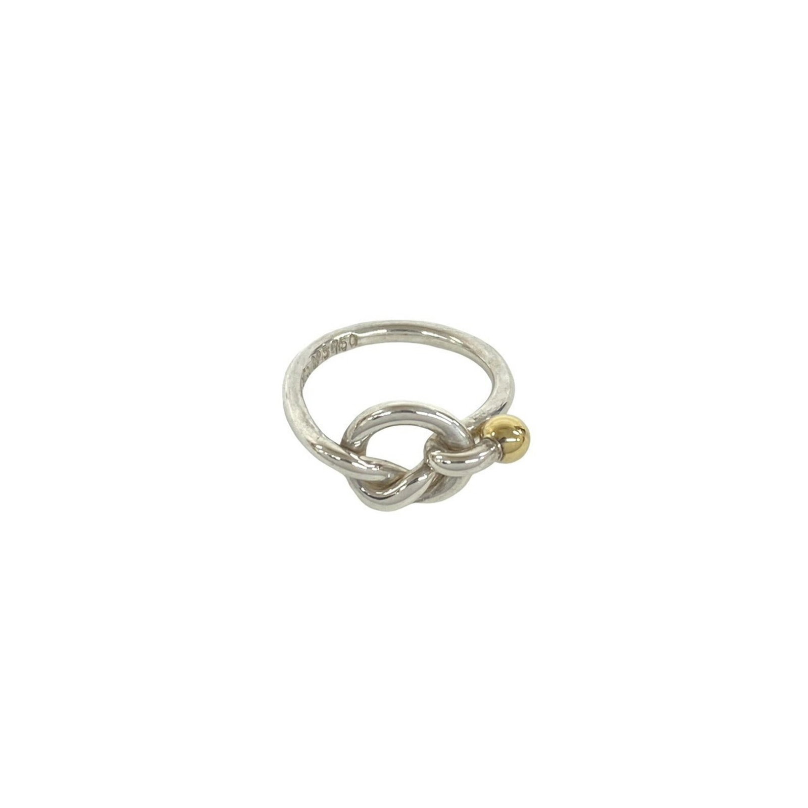 Tiffany Band Ring Silver 925 Yellow Gold (18K): Tiffany Band Ring Silver 925 Yellow Gold (18K) Silver 925 and 18K yellow gold come together in this elegant band ring from Tiffany, available in US size 4.5. The item's classic design makes it a timel