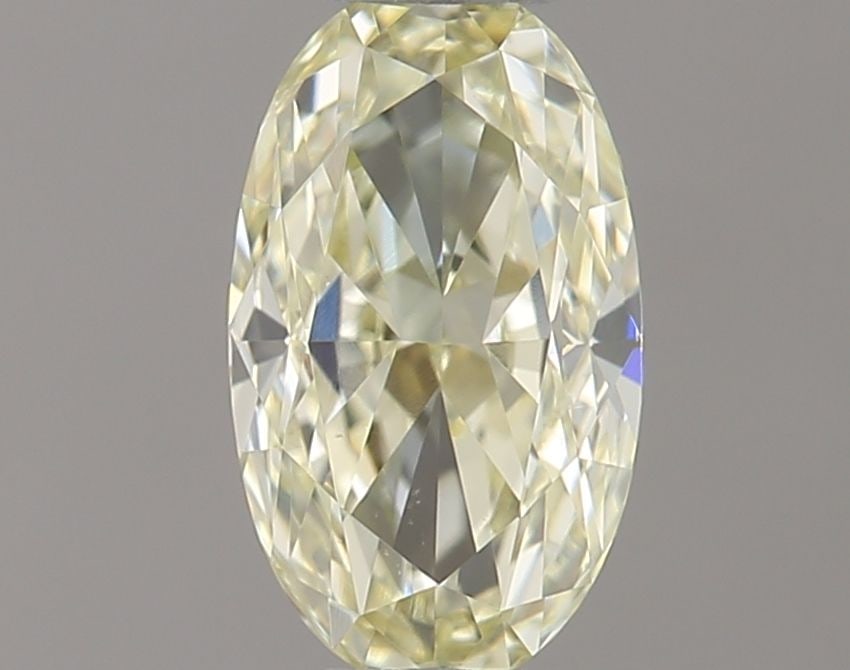 Oval 0.42ct Fancy Light Yellow VVS2 - Loose Natural Diamond: Oval 0.42ct Fancy Light Yellow VVS2 - Loose Natural Diamond Oval cut diamond with a Fancy Light Yellow color and VVS2 clarity, boasting exceptional polish and symmetry. This loose natural diamond