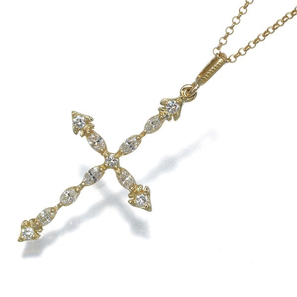 Ahkah Necklace Diamond 0.26Ct Transia Cross 18K 750 Yellow Gold: Ahkah Necklace Diamond 0.26Ct Transia Cross 18K 750 Yellow Gold The Ahkah Necklace features a stunning 0.26ct diamond pendant set in 18k yellow gold, showcasing the beauty of Transia Cross design. Thi