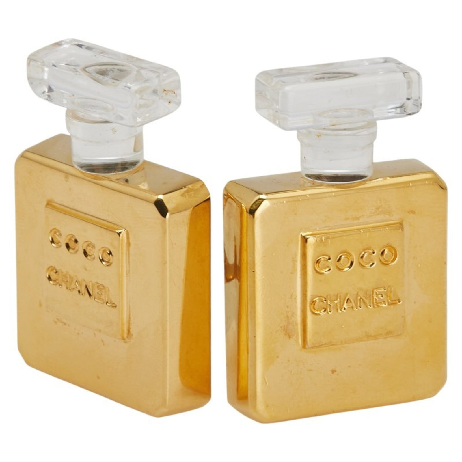 Chanel Clip Earrings Plastic: Chanel Clip Earrings Plastic Chanel Clip Earrings Plastic are made from high-quality plastic and feature a clear design with gold accents. They have a distinctive clip-on style, measuring 44.30mm x 28