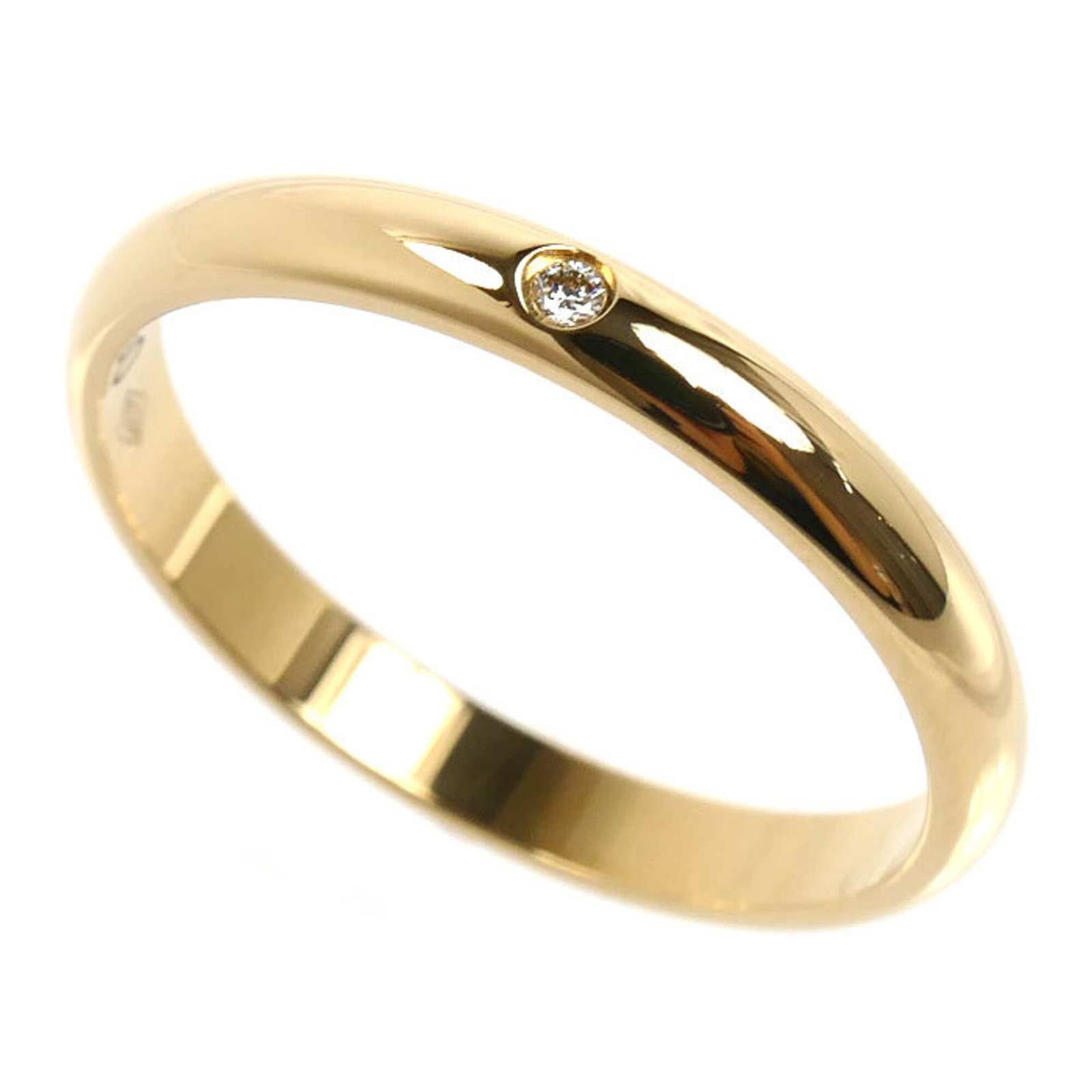 Yellow Gold Cartier 18K Ring: Yellow Gold Cartier 18K Ring Yellow gold Cartier ring features a diamond stone and is made from 18K yellow gold. The ring's band size is 54 US, corresponding to a women's size 7. This piece bears the 