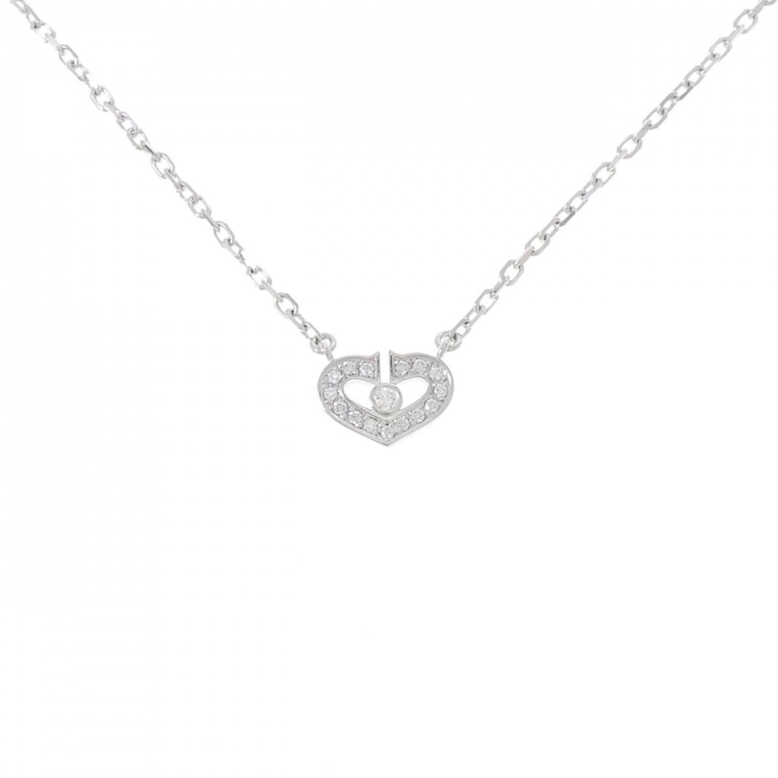 Cartier Necklace with C Heart: Cartier Necklace with C Heart Cartier's iconic necklace features a stunning C-shaped pendant made from white gold (18K) and adorned with a diamond. The necklace boasts a sleek design, measuring 39 cm 