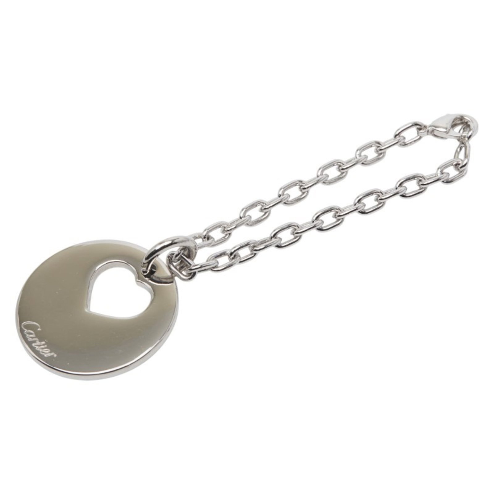 Metal Italian Charm Cartier: Metal Italian Charm Cartier Cartier's Italian charm is a sleek and sophisticated accessory, measuring 30.00mm in diameter with a silver metal finish. This elegant charm comes in a box and dust bag for