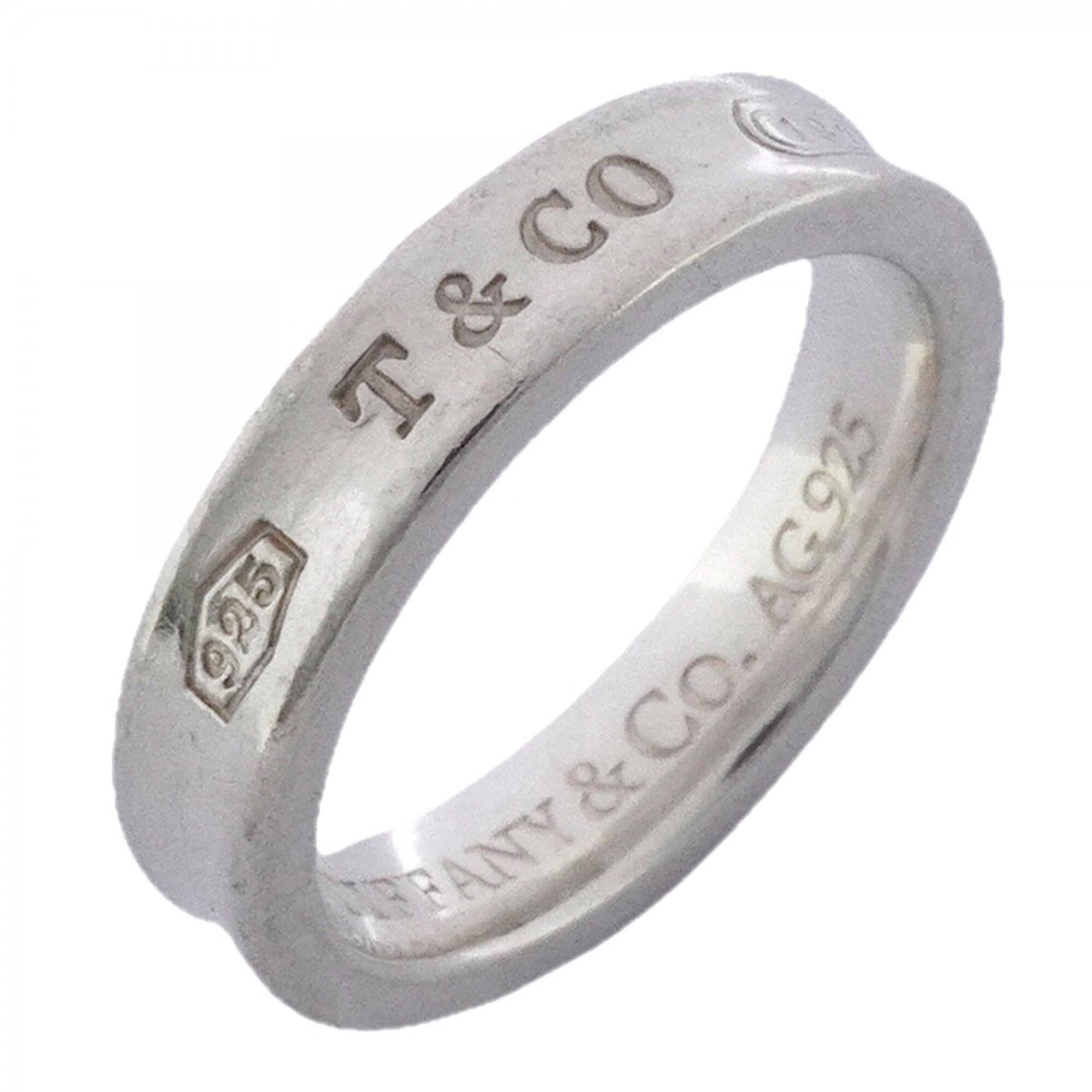 Silver band ring Tiffany 925: Silver band ring Tiffany 925 Silver band ring from Tiffany Type, made from high-quality silver 925. This women's band ring features a sleek design and is available in US size 4. Item Specifics: Brand: