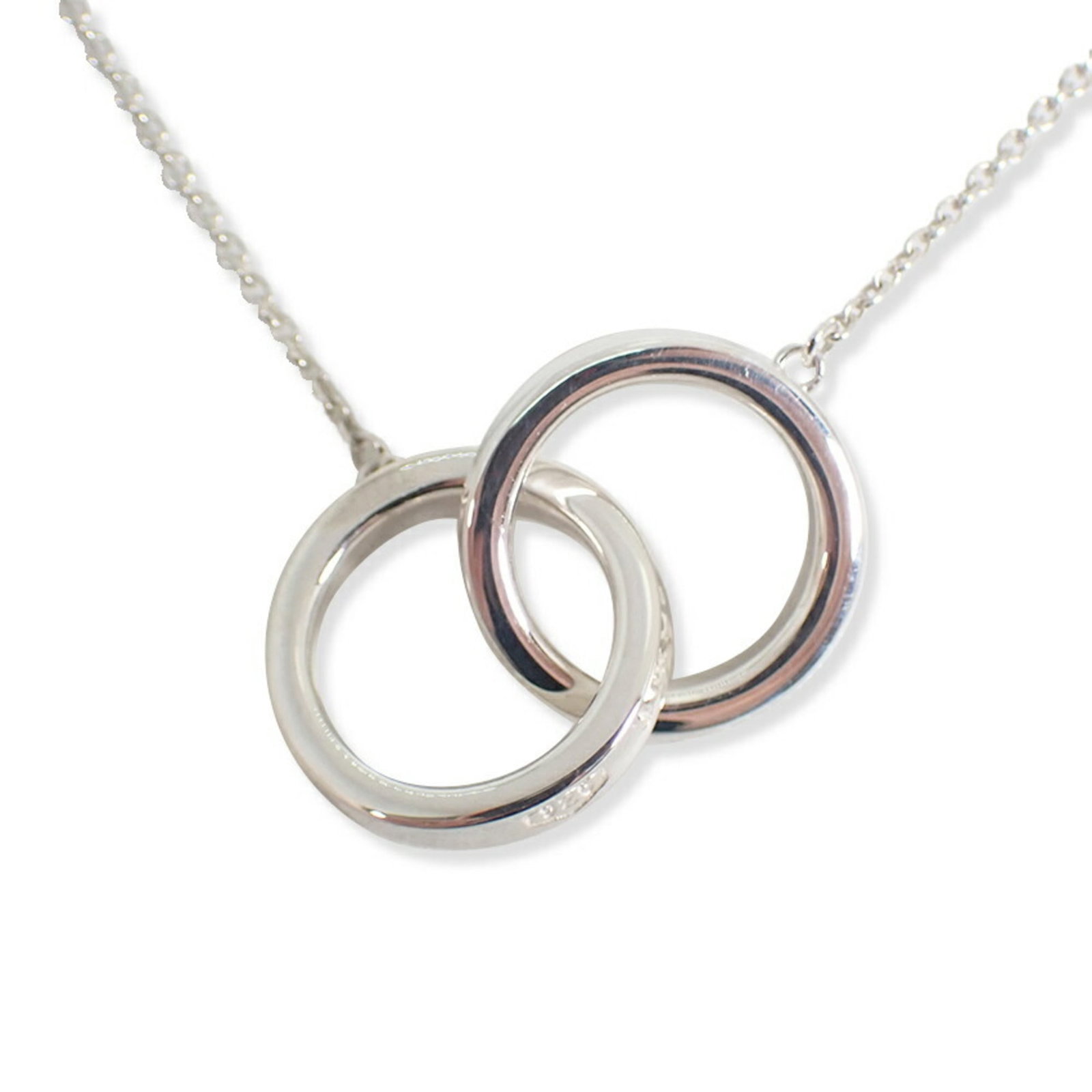 Interlocking circle necklace 925 1837 by Tiffany Co: Interlocking circle necklace 925 1837 by Tiffany Co Item Specifics: Brand: Tiffany Necklace Type: Necklace Gender: Women Material: Sterling silver 925 Neck Circumference: 41.5 cm / 16.33'' Pendant Siz