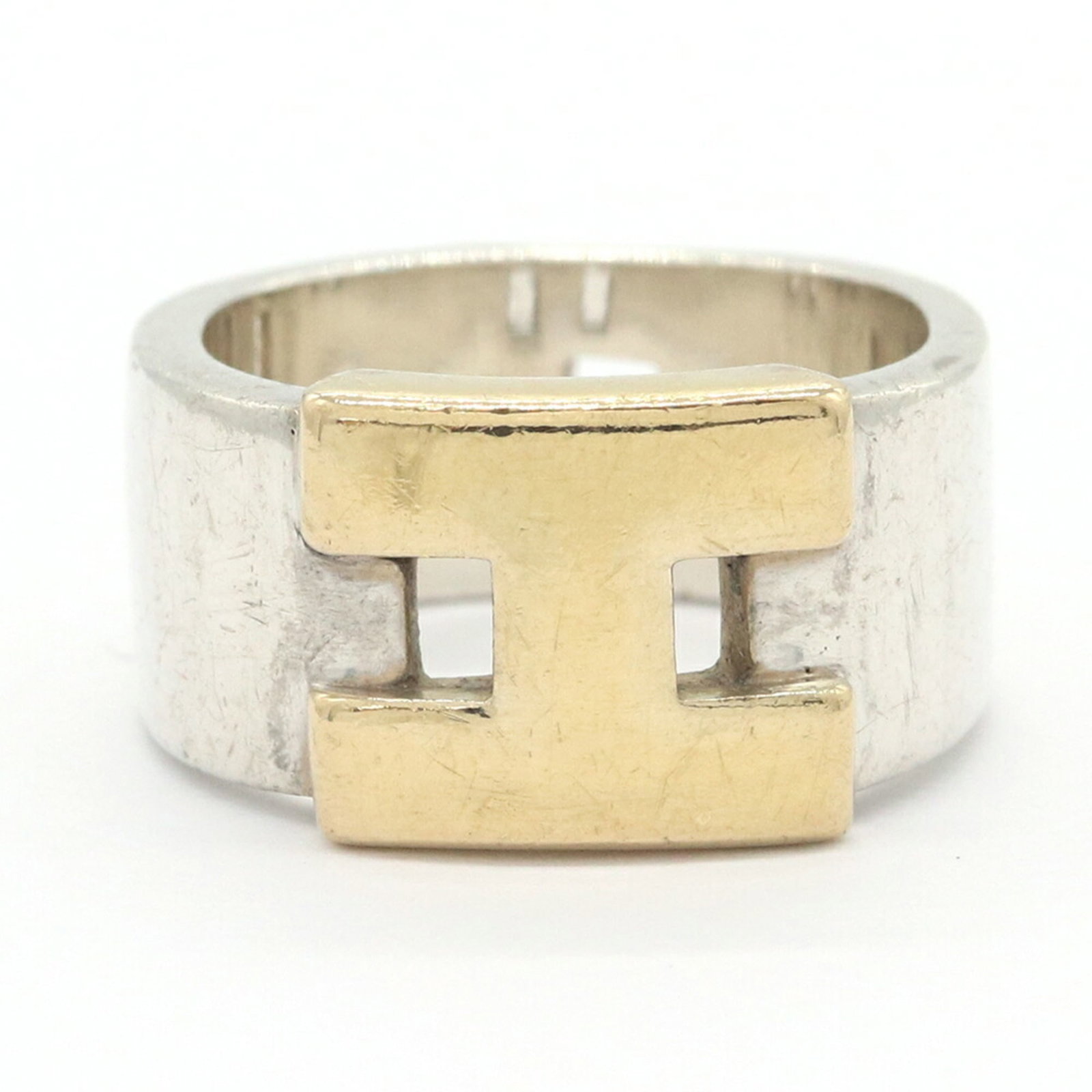 Sterling Silver Ring Band Hermes Gold 18K Yellow: Sterling Silver Ring Band Hermes Gold 18K Yellow Sterling silver band ring with an elegant Hermes gold 18K yellow accent, adding a touch of sophistication to any outfit. This beautiful piece is