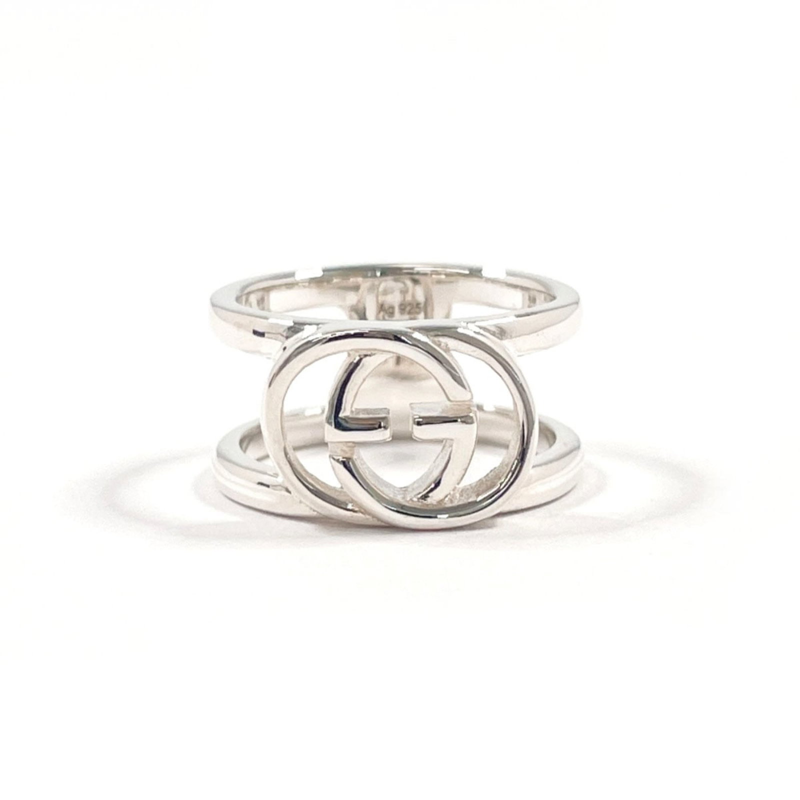 Gucci Band Ring Silver 925: Gucci Band Ring Silver 925 Silver band ring from Gucci, made with high-quality silver 925 material. This elegant design features a slender width of 9mm and weighs approximately 4.07g, making it a