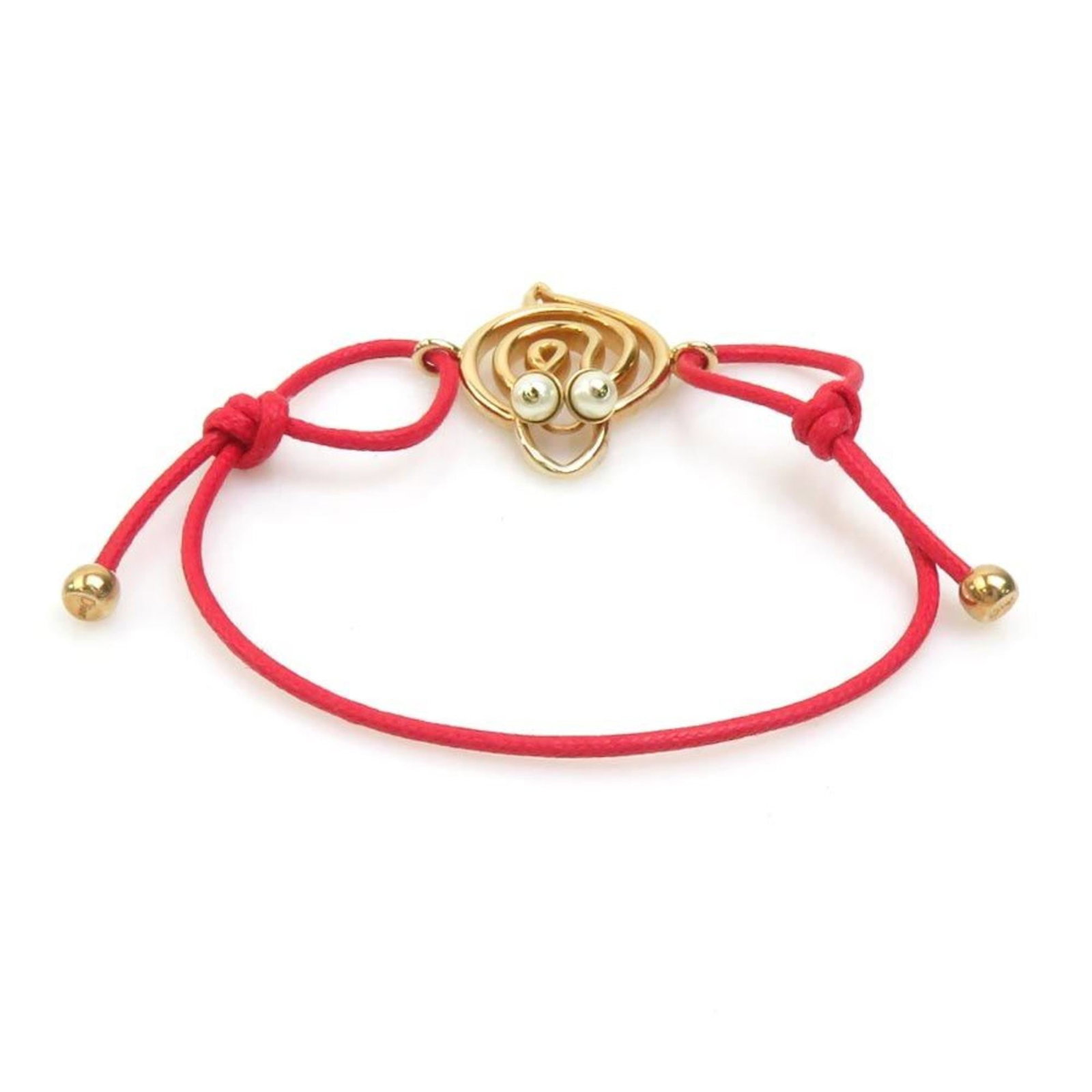 Charm bracelet metal nylon by Christian Dior: Charm bracelet metal nylon by Christian Dior Metal and nylon charm bracelet from Christian Dior, available in gold with a red accent, measures 20cm in length. This classic design features metal and