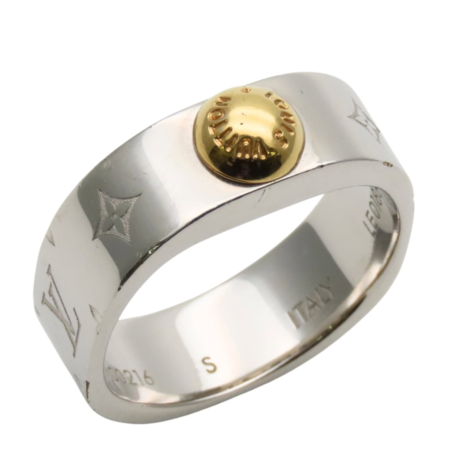 Metal band ring by Louis Vuitton: Metal band ring by Louis Vuitton Silver metal band ring from Louis Vuitton, available in US size 5.5. This band ring features the iconic Louis Vuitton design and is made from high-quality metal