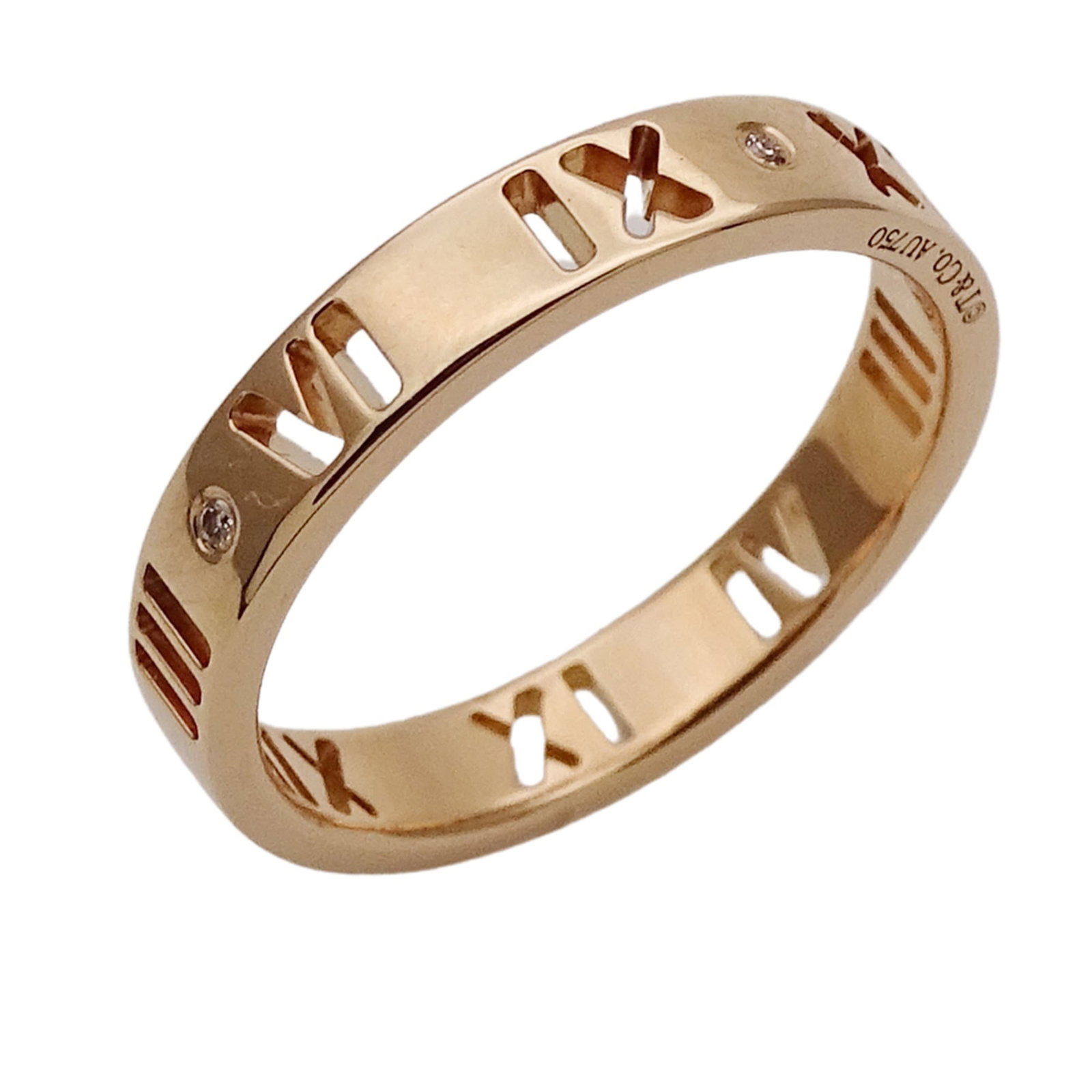 Pink Gold Tiffany Ring Band: Pink Gold Tiffany Ring Band Pink gold Tiffany ring band, crafted from 18K pink gold, features a classic design for women. This US size 6 band showcases the iconic Tiffany brand, making it a stylish