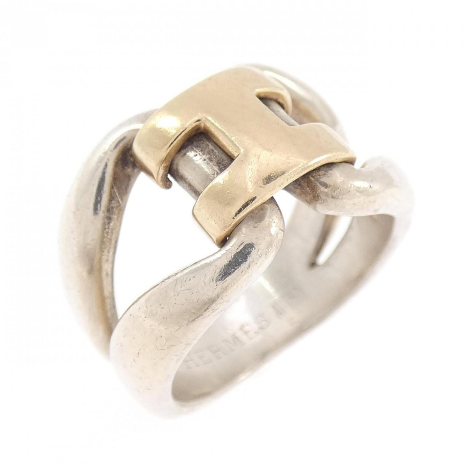 Hermes Band Ring Silver 925 Yellow Gold (18K): Hermes Band Ring Silver 925 Yellow Gold (18K) Silver and yellow gold (18K) come together in this elegant band ring from Hermes, crafted with 925 sterling silver. The 18K yellow gold adds a touch of lu