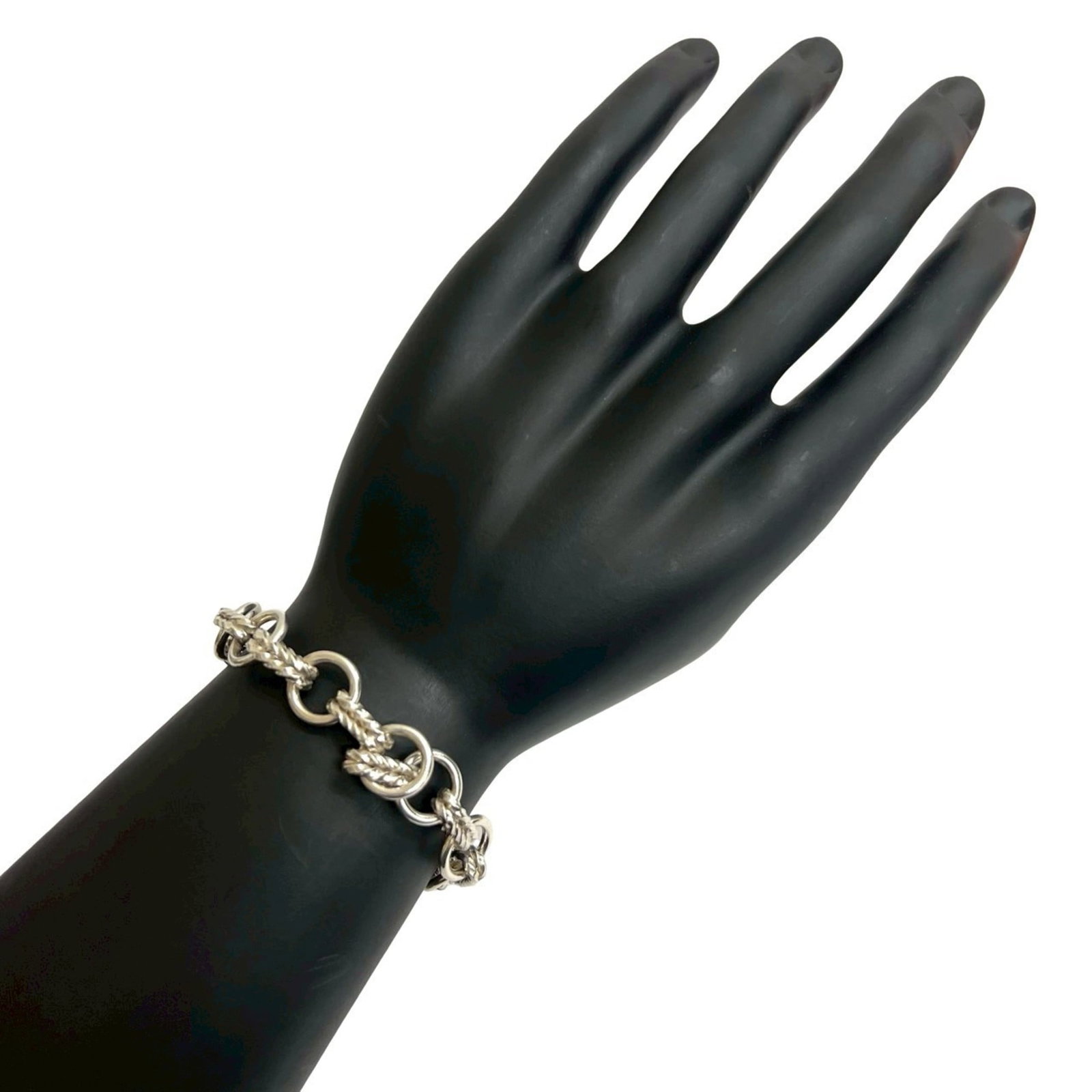 Hermes Charm Bracelet of Silver: Hermes Charm Bracelet of Silver Silver Charm Bracelet from Hermes, measuring 19cm in length. This charm bracelet features the iconic silver material and classic design that has become synonymous with 