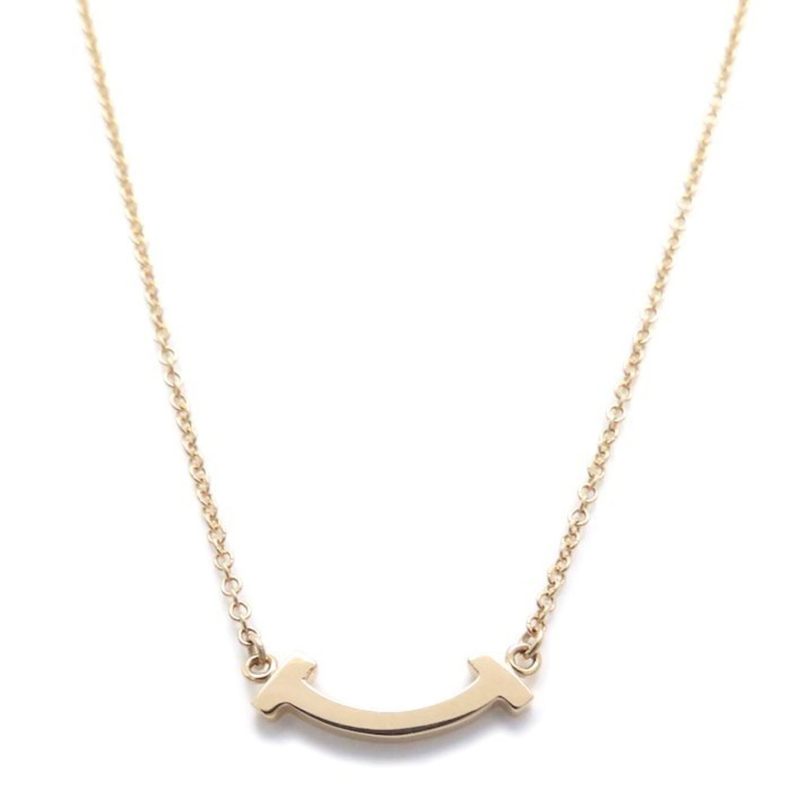 Tiffany&Co. Tiffany T Smile Necklace Mini 18Kpg Women'S 62617721 295717: Tiffany&Co. Tiffany T Smile Necklace Mini 18Kpg Women'S 62617721 295717 Pink gold (18K) Tiffany T Smile Necklace with a petite pendant featuring a 3.6mm x 13.5mm design, suspended from a chain designe