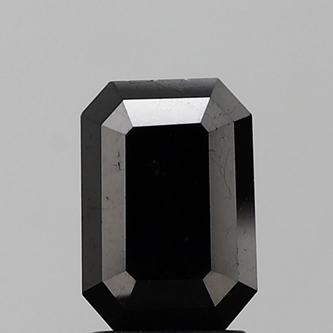 Emerald 3.6ct Black VVS2 - Loose Natural Diamond: Emerald 3.6ct Black VVS2 - Loose Natural Diamond 3.6ct Emerald Cut Black Diamond with Excellent VVS2 Clarity, EX Polish, and Symmetry. This natural diamond boasts a striking black color and exceptiona