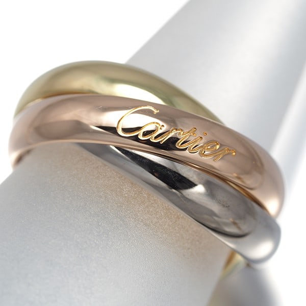 Yellow White Rose Gold Classic Eu50 3Color 18K Cartier Ring Trinity: Yellow White Rose Gold Classic Eu50 3Color 18K Cartier Ring Trinity The Cartier Trinity ring boasts a striking multi-tone gold design, featuring 18k yellow, white, and rose gold accents in a classic E