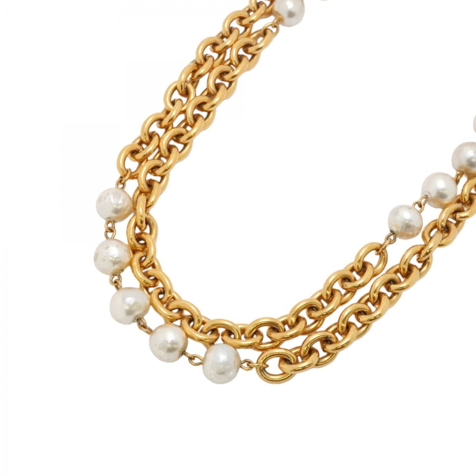 Chanel GP Plated Faux Gold Pearl Necklace for Women: Chanel GP Plated Faux Gold Pearl Necklace for Women Gold plating gives this Chanel GP necklace a luxurious touch, while the faux gold pearl adds a subtle shine. The 94.5 cm chain circumference provide