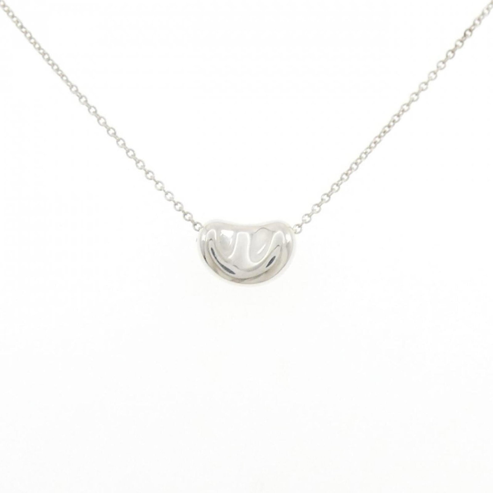 Tiffany Necklace Beans: Tiffany Necklace Beans Silver 925 Tiffany Necklace Type Pendant with a 44 cm / 17.32'' adjustable neck circumference, featuring a 7.5mm x 11mm pendant size, bears a signature. This necklace is made