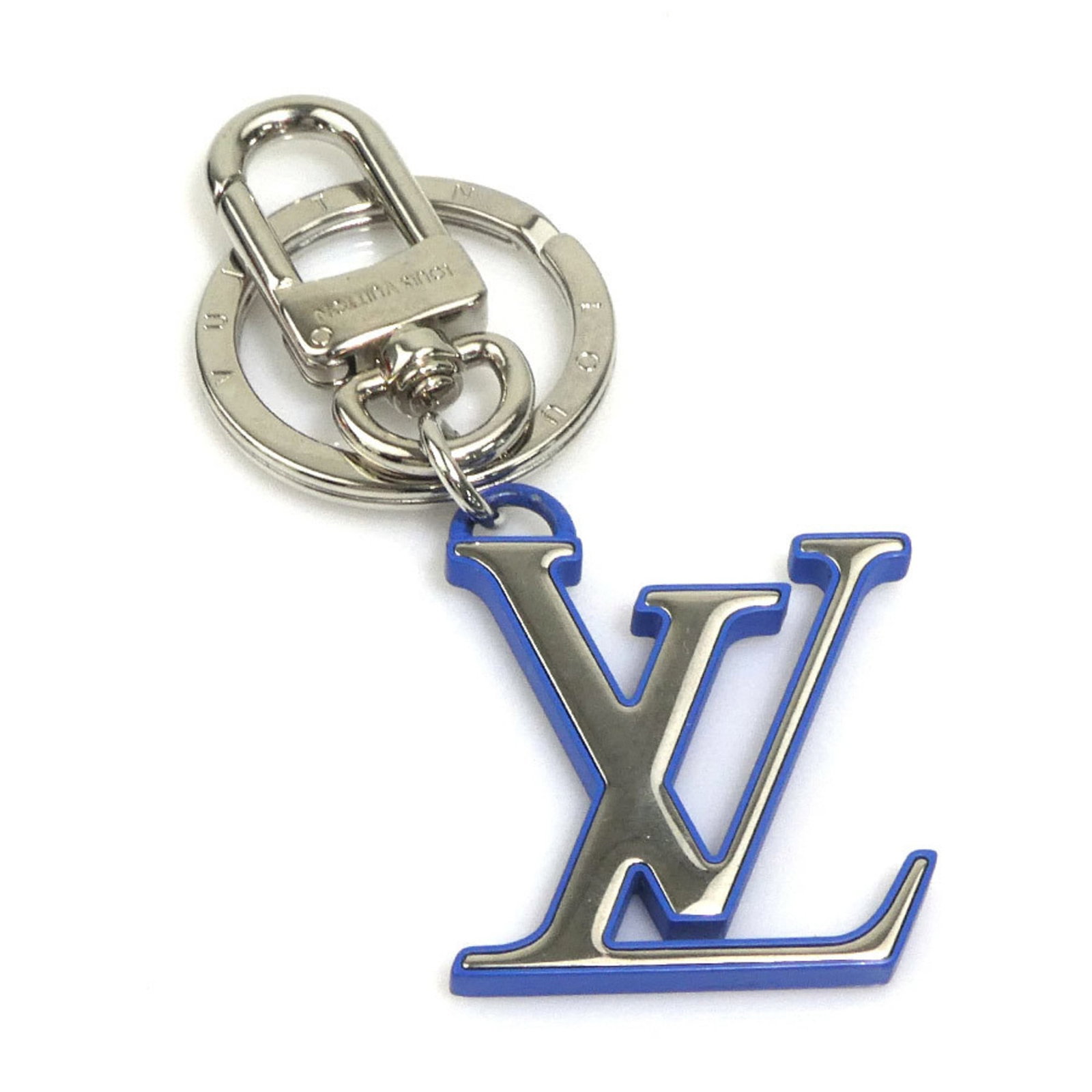 Metal Handbag Louis Vuitton Charm: Metal Handbag Louis Vuitton Charm Metal Handbag Louis Vuitton Charm - A stylish metal charm featuring the iconic Louis Vuitton brand, crafted in Italy with a sleek blue and silver finish. The compact