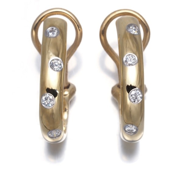 Tiffany&Co. Earrings Diamond Dots 18K 750 Yellow Gold/ 950 Platinum: Tiffany&Co. Earrings Diamond Dots 18K 750 Yellow Gold/ 950 Platinum Tiffany&Co.'s Earrings in 18K Yellow Gold and 950 Platinum showcase a unique clip-on design featuring natural diamond dots. The earr