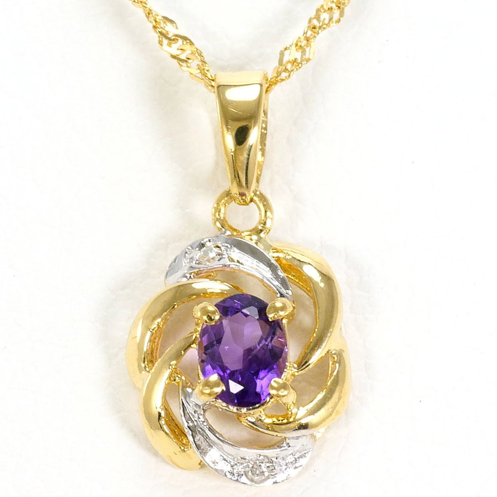 18K (18-Karat) Yellow Gold Necklace With Amethyst And Diamond (Carat Mark Not Specified) Total: 18K (18-Karat) Yellow Gold Necklace With Amethyst And Diamond (Carat Mark Not Specified) Total 18K yellow gold necklace with an elegant amethyst and diamond pendant, adding a touch of sophistication t