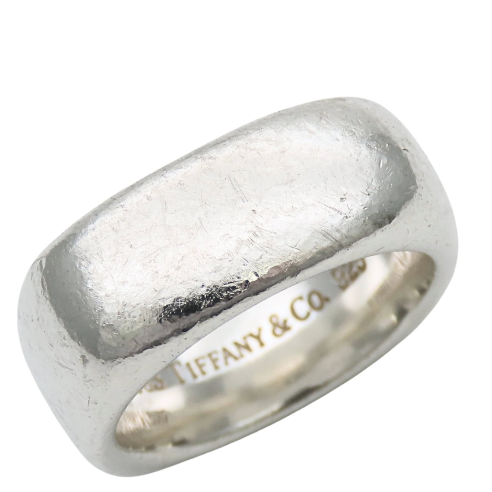 Silver band ring Tiffany 925: Silver band ring Tiffany 925 Silver band ring Tiffany 925 features a sleek, silver design. Made from high-quality 925 sterling silver, this women's band ring is a classic choice for everyday wear. The