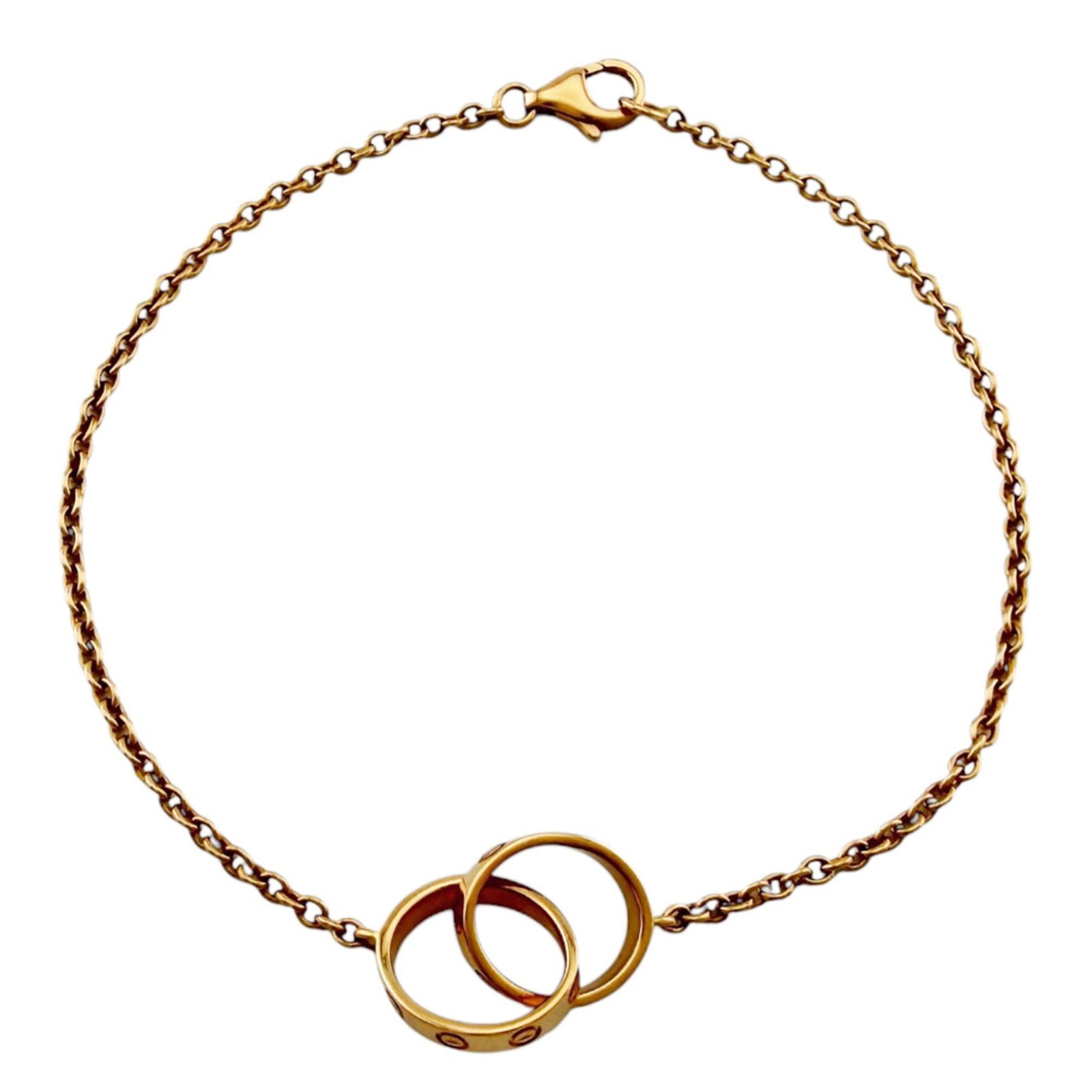 Cartier Charm Bracelet Pink Gold (18K): Cartier Charm Bracelet Pink Gold (18K) Cartier Charm Bracelet Pink Gold (18K) bears a signature. Made from pink gold (18K), this handmade charm bracelet features a width of 1.5mm and weighs 3.9g, with
