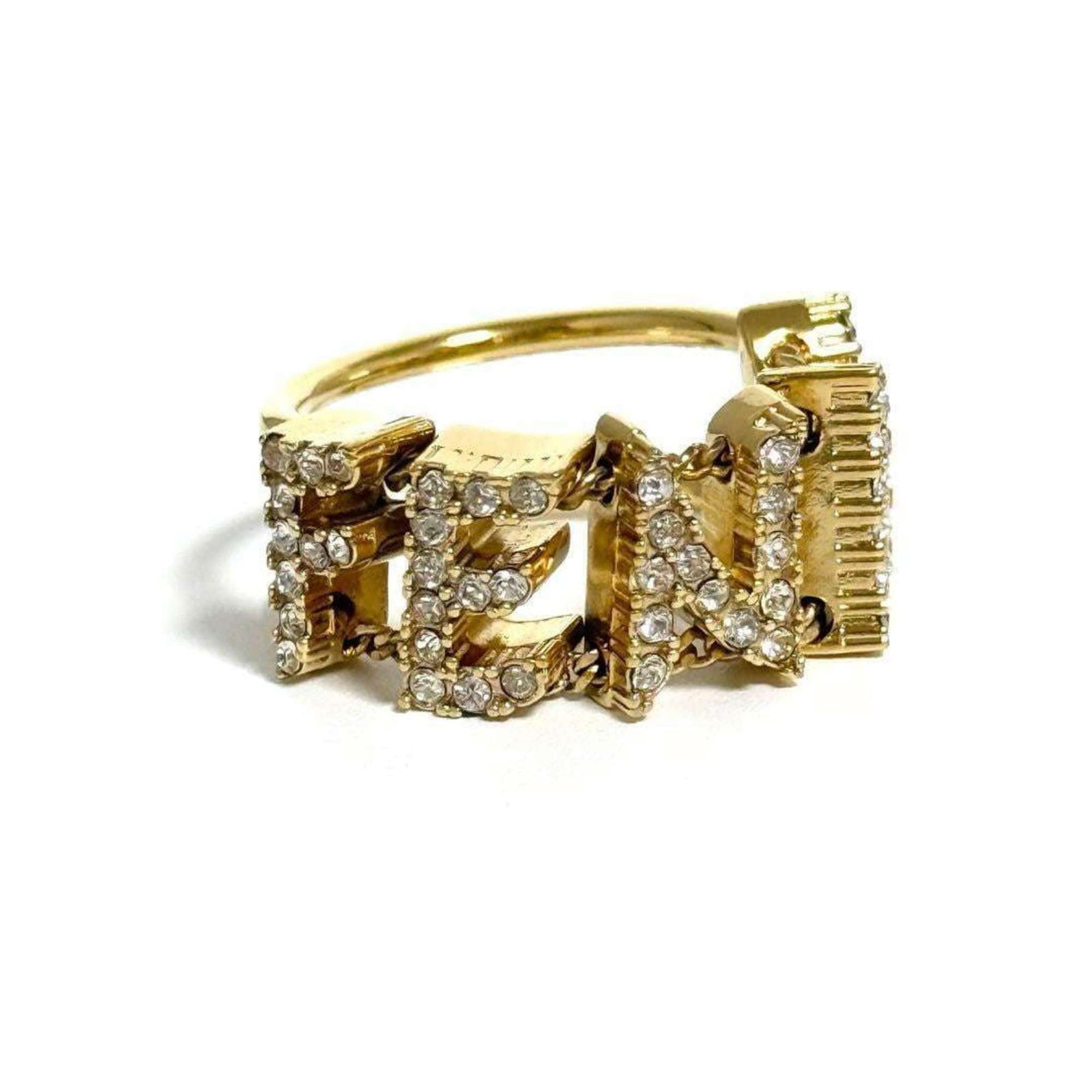 Fendi Band Ring Metal Rhinestone: Fendi Band Ring Metal Rhinestone Metal band ring with rhinestones from Fendi, available in US size 6. This stylish accessory comes in a box for added convenience. The ring features metal and rhineston