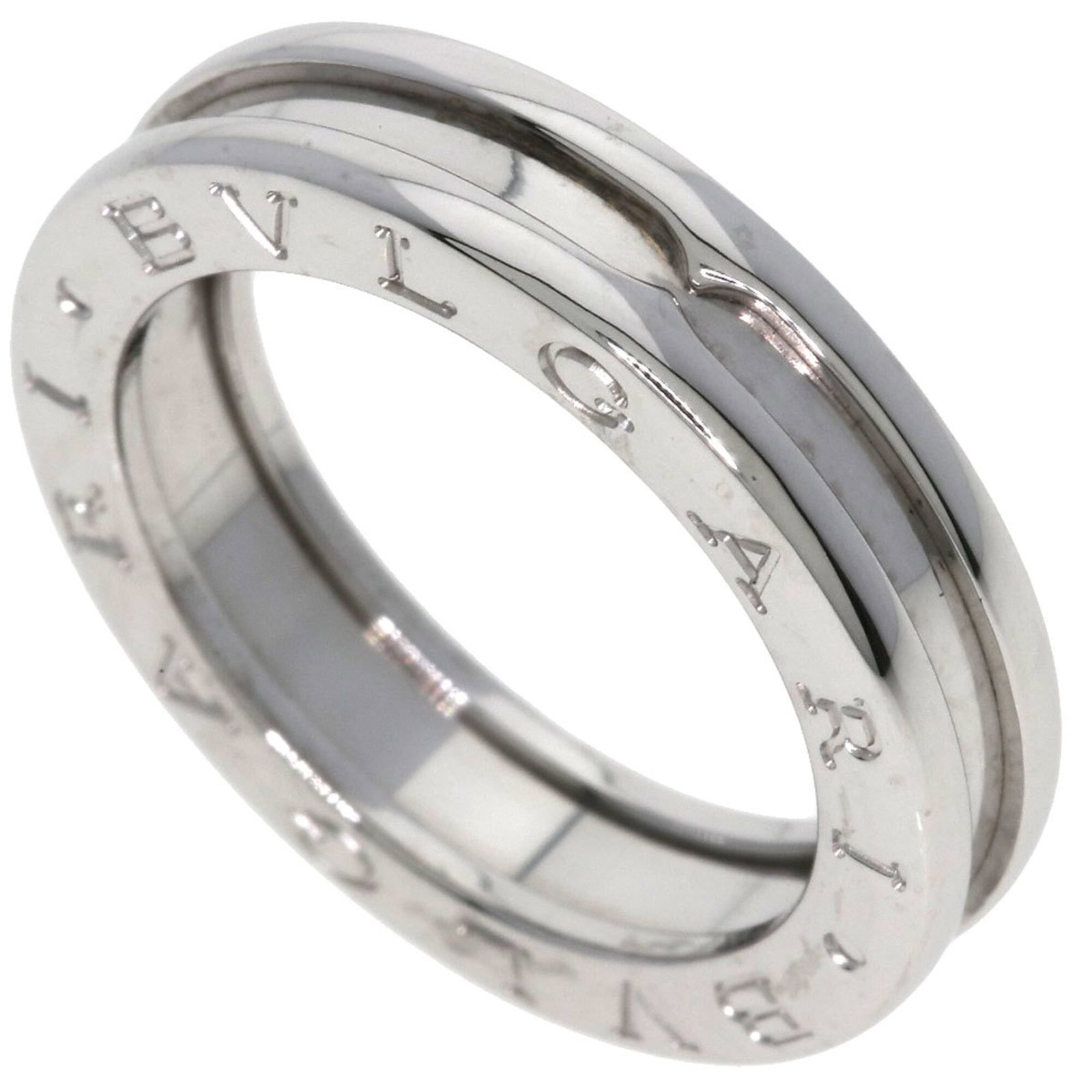 White Gold Bvlgari Ring Band: White Gold Bvlgari Ring Band White gold (18K) band ring from Bvlgari, available in US size 6.5. This elegant ring features a classic design that complements a variety of styles, with its simple yet so