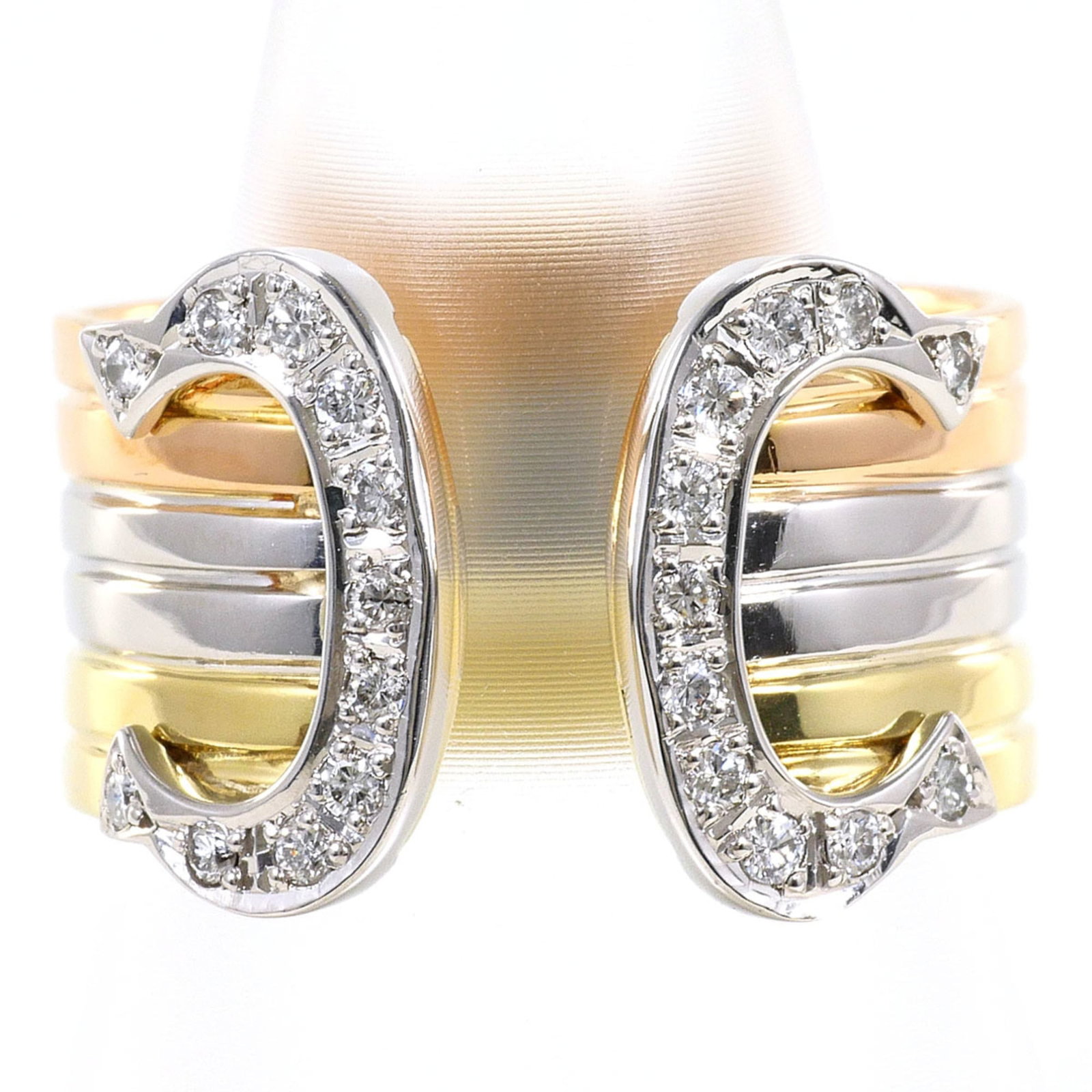 Unbranded Band Ring Pink Gold (18K) Platinum 900 Yellow Gold (18K): Unbranded Band Ring Pink Gold (18K) Platinum 900 Yellow Gold (18K) Pink gold, Platinum 900, and yellow gold (18K) come together in this elegant band ring, available in US size 4.5. The 7mm wide band f