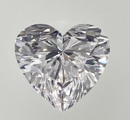 GIA Heart 0.4ct Faint Pink VVS1 - Loose Natural Diamond: GIA Heart 0.4ct Faint Pink VVS1 - Loose Natural Diamond GIA certified, this loose natural diamond boasts exceptional clarity with a VVS1 grade and vibrant Faint Pink color. Measuring 4.7 x 5.01 x 2.97