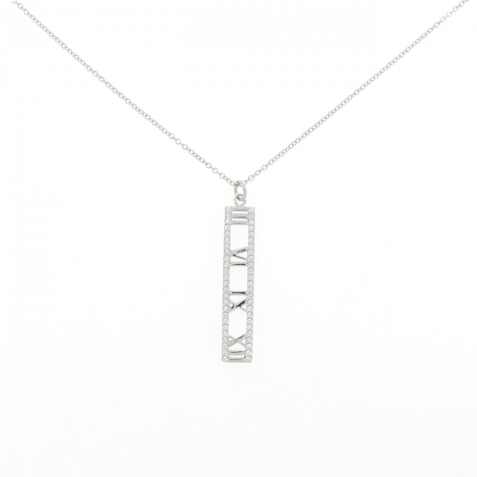 Atlas Tiffany Necklace: Atlas Tiffany Necklace White gold pendant with a 30.9mm x 5.7mm diamond, set in an 18K white gold chain with a circumference of 41 cm / 16.14''. The necklace features a signature from the artist. Item