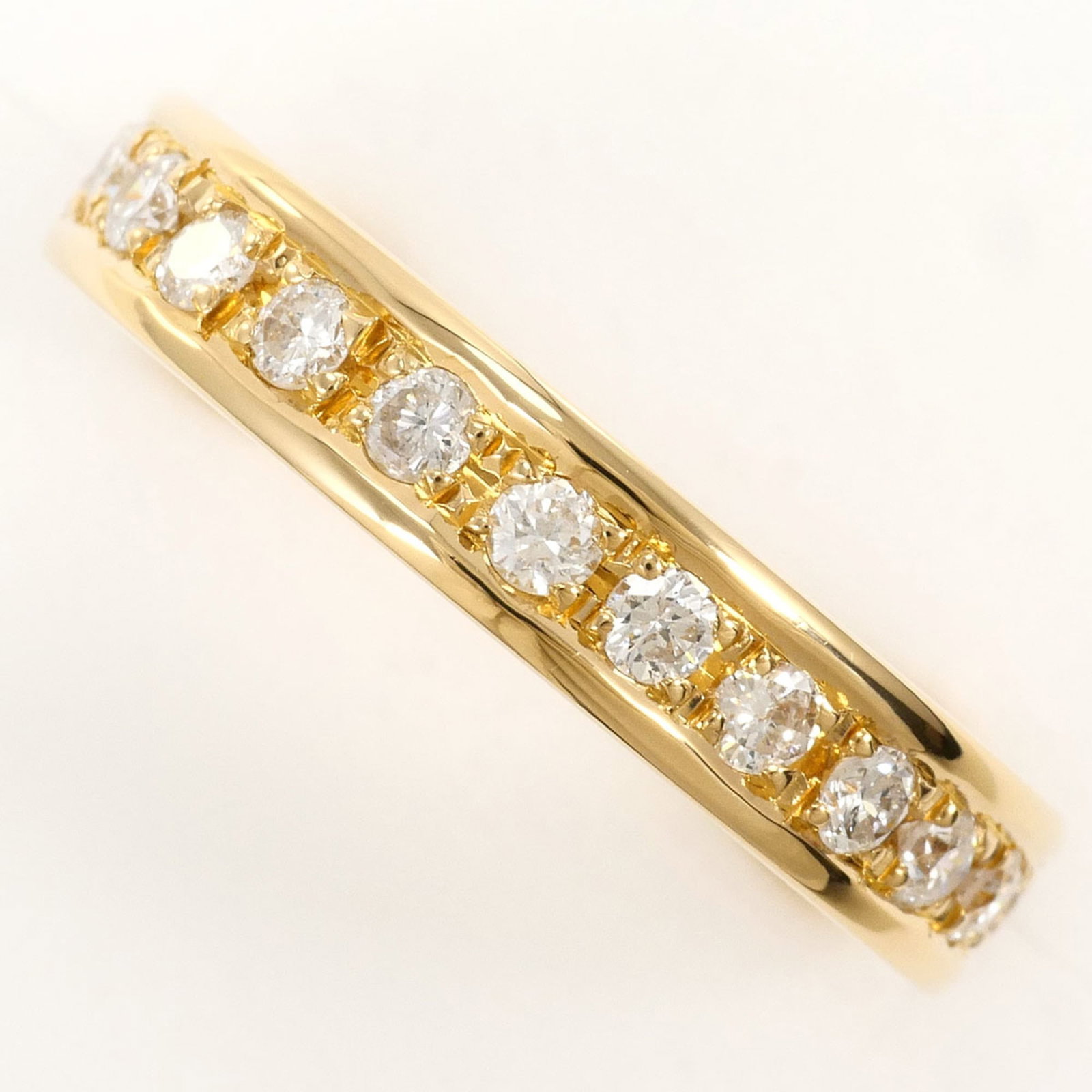 Unbranded Band Ring Yellow Gold (18K): Unbranded Band Ring Yellow Gold (18K) Unbranded band ring in bright yellow gold, crafted from 18K metal for a rich, warm tone. The 0.75ct diamond adds subtle sparkle to this understated design, availa