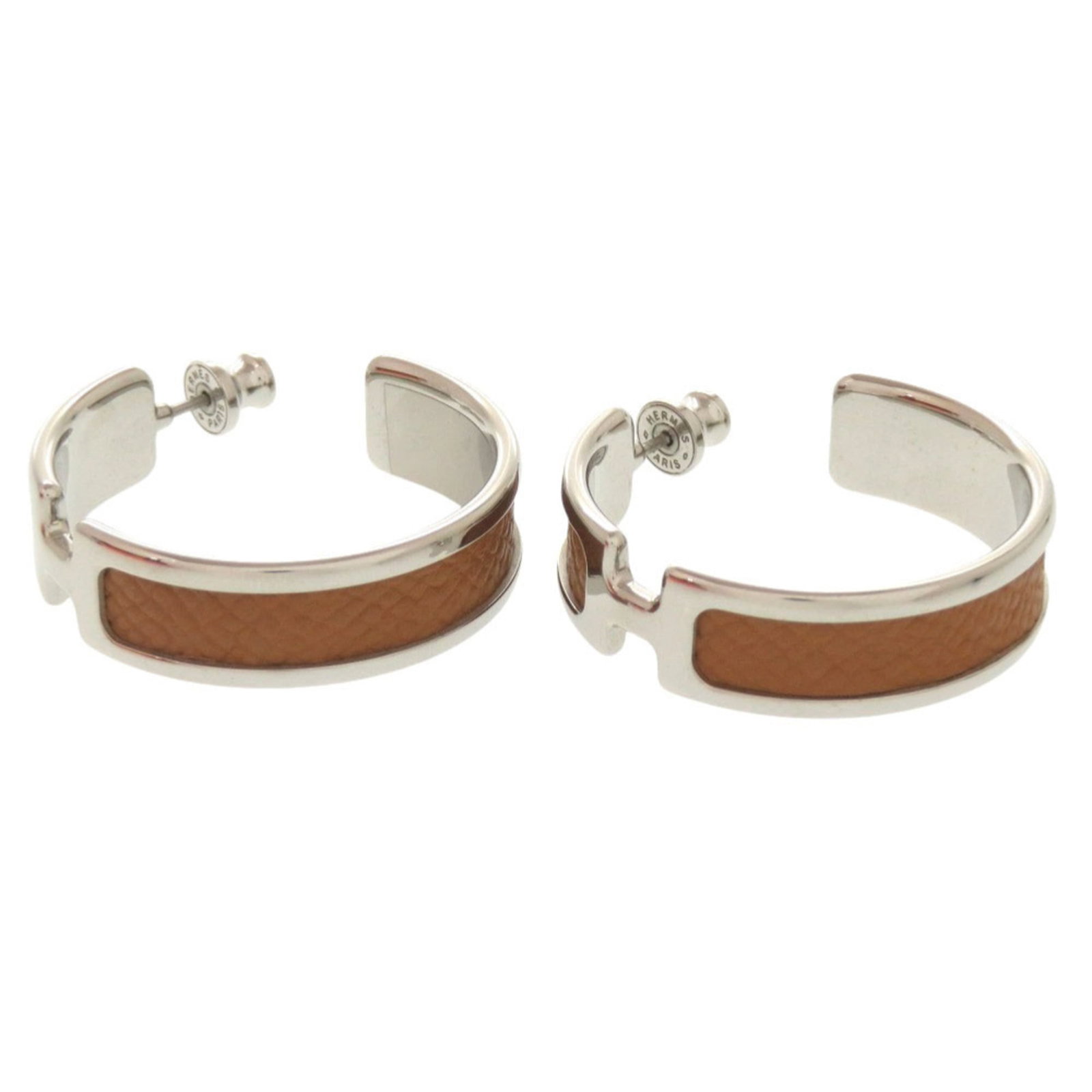Hermes Stud Epsom Leather Metal: Hermes Stud Epsom Leather Metal Epsom leather and gold metal come together in these elegant stud earrings, crafted by the renowned French brand Hermes. The Epsom leather provides a rich, luxurious fee