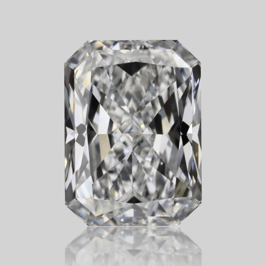 GIA Radiant 0.71ct F VVS2 - Loose Natural Diamond: GIA Radiant 0.71ct F VVS2 - Loose Natural Diamond 0.71ct GIA-certified F VVS2 diamond, boasting exceptional clarity and polish, sits within its natural setting, awaiting a new home. The stone's radian