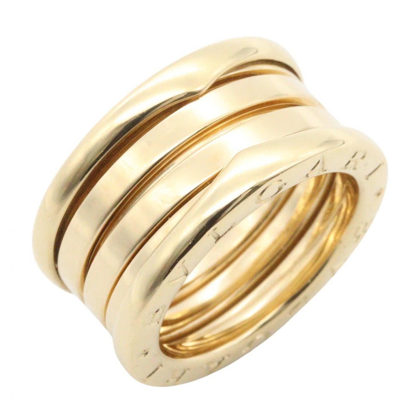 Bvlgari Band Ring Yellow Gold (18K): Bvlgari Band Ring Yellow Gold (18K) Yellow gold (18K) Bvlgari Band Ring, available in US size 4. This band ring features the iconic Bvlgari brand and is crafted from high-quality yellow gold. A stylis
