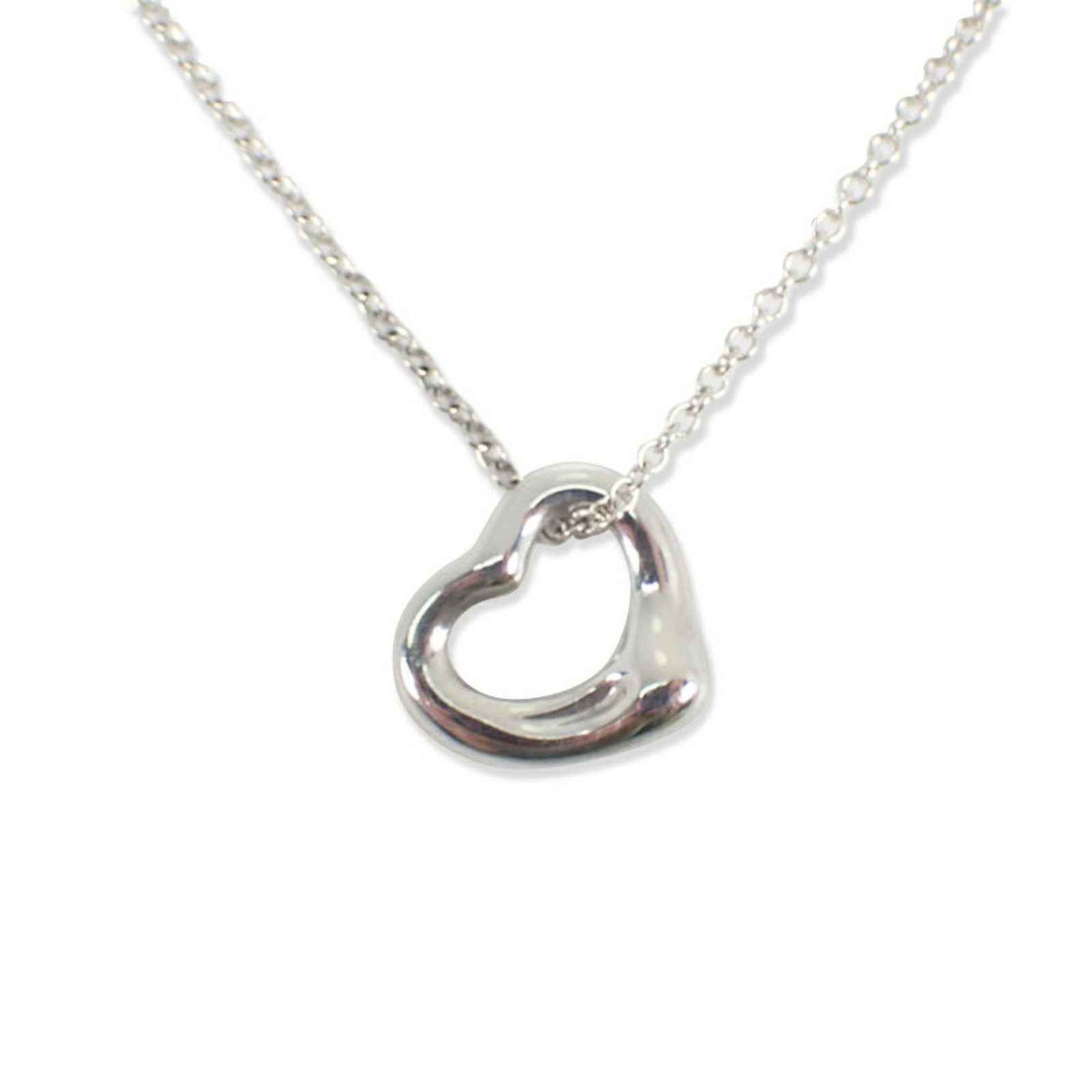 Tiffany & Co. 925 Heart Pendant Necklace: Tiffany & Co. 925 Heart Pendant Necklace Sterling silver 925 Tiffany & Co. pendant necklace boasts a classic design with a 9.9mm x 11.1mm heart-shaped pendant, suspended from a 40.5 cm chain. The neck