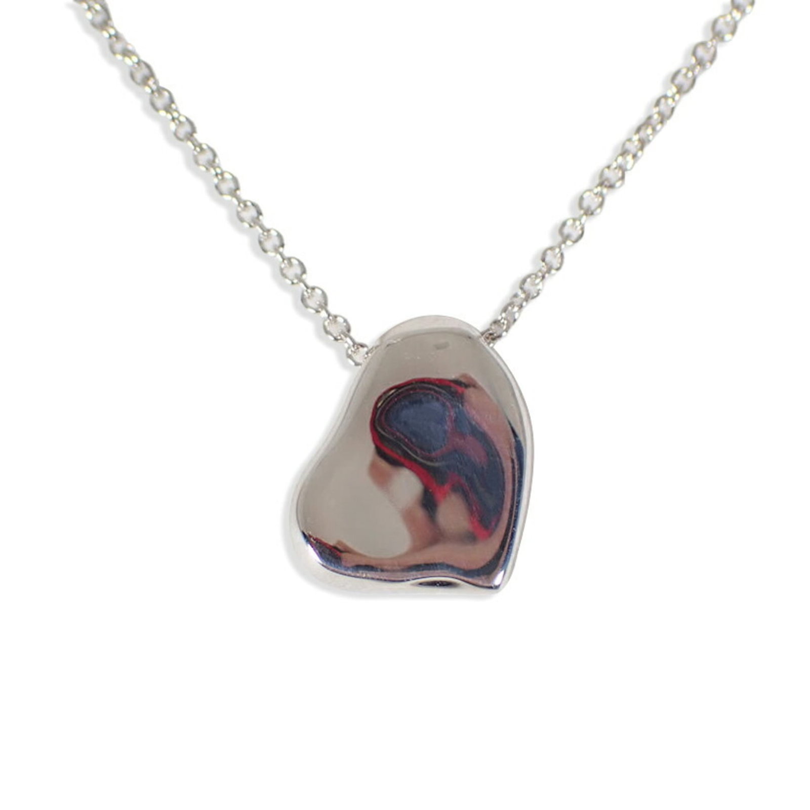 Tiffany & Co. 925 Full Heart Pendant: Tiffany & Co. 925 Full Heart Pendant Sterling silver pendant with a full heart design, measuring 9mm x 12.3mm, suspended from a necklace featuring a 41.5 cm / 16.33'' circumference. The pendant is mad