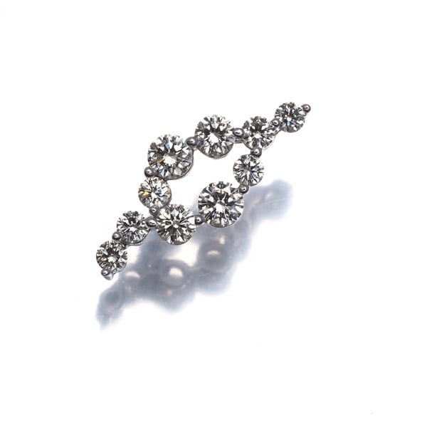 Light Brown Diamond 0.52Ct Pendant 18K 750 White Gold: Light Brown Diamond 0.52Ct Pendant 18K 750 White Gold Natural light catches the warm tones of this 0.52ct light brown diamond pendant, set in 18k white gold. The delicate design features a subtle