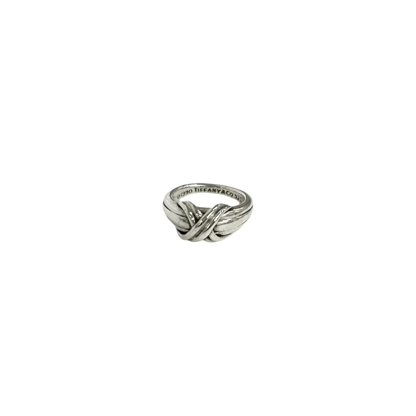 Silver band ring Tiffany 925: Silver band ring Tiffany 925 Silver band ring Tiffany 925. This women's silver band ring features a classic design made from high-quality sterling silver (925). Available in US size 5, it showcases